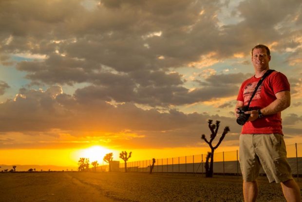U.S. Naval Officer Daniel Dopler with his camera. Photo courtesy Daniel Dopler.