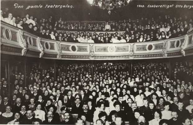 Old theatre hall photo via Flickr Commons.