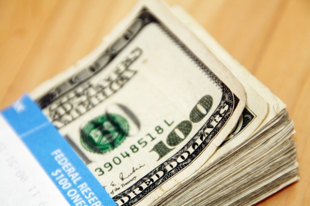 who pays photographers writers