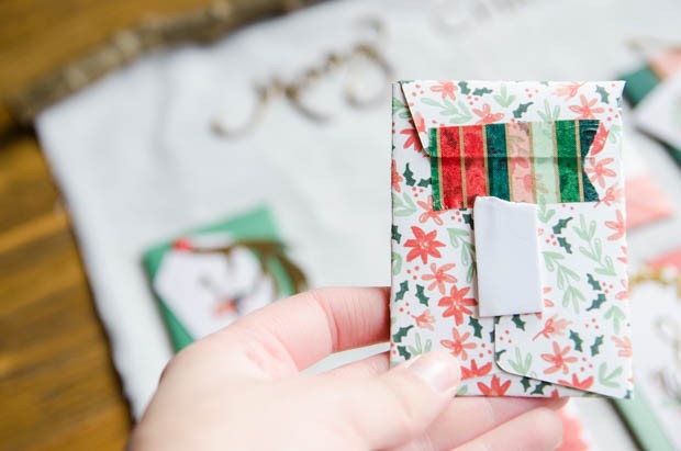An activity-based advent calendar DIY from CreativeLive! https://blog.creativelive.com/diy-a-lovely-advent-calendar-with-my-minds-eye-christmas-on-market-street-supplies/