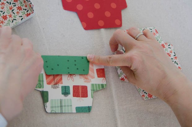 An activity-based advent calendar DIY from CreativeLive! https://blog.creativelive.com/diy-a-lovely-advent-calendar-with-my-minds-eye-christmas-on-market-street-supplies/