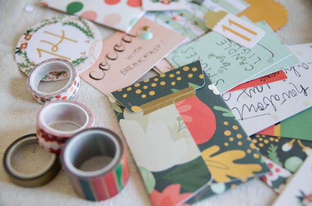 An activity-based advent calendar DIY from CreativeLive! https://blog.creativelive.com/diy-a-lovely-advent-calendar-with-my-minds-eye-christmas-on-market-street-supplies/