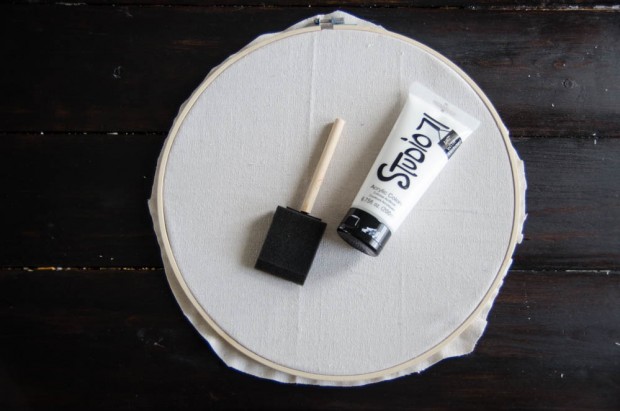 A base coat makes a big difference when using paint to create embroidery hoop art.