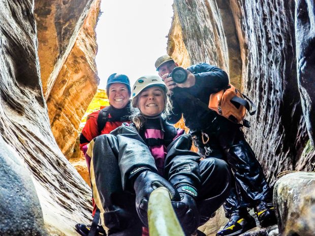 Kathy Holcombe and family in a cave