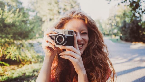 Photographer with camera