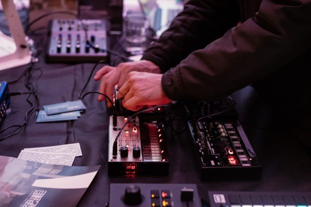 man connecting to music audio interface